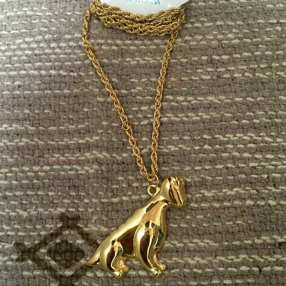 Gold dinosaur necklace